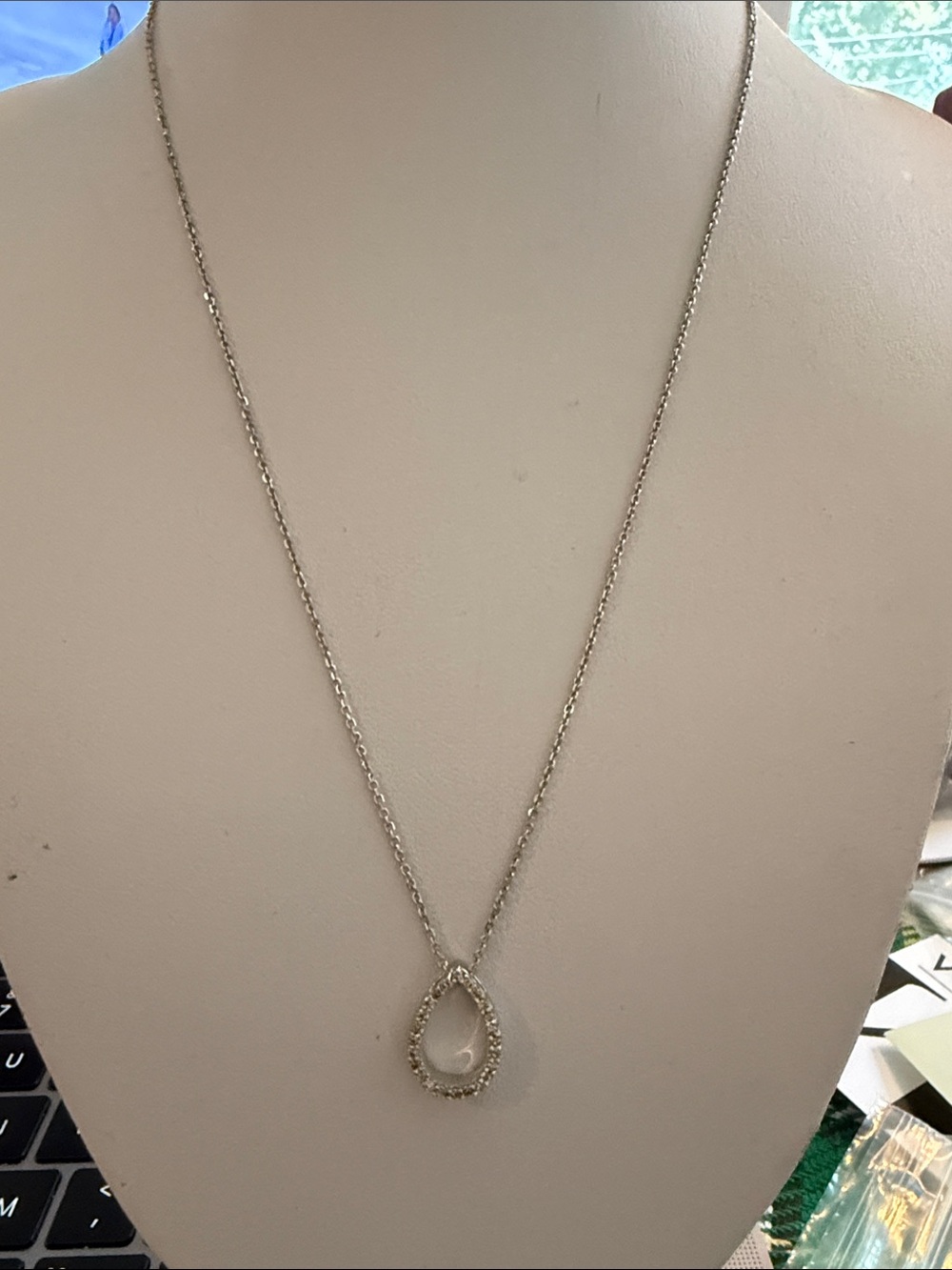14k white gold diamond pendant 5/8” long with 18” chain 14 k white gold